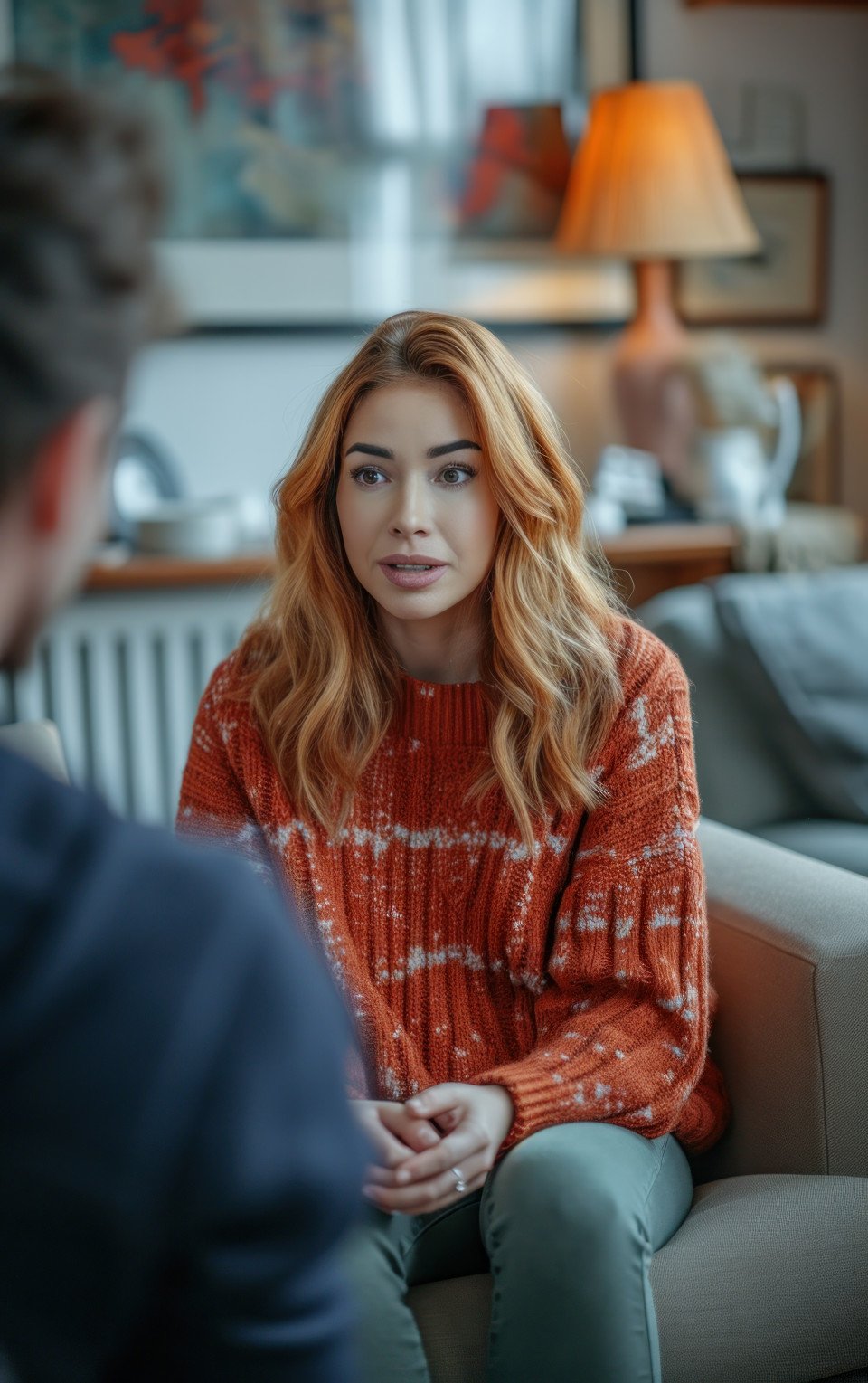 Woman discussing mental health with doctor in living room