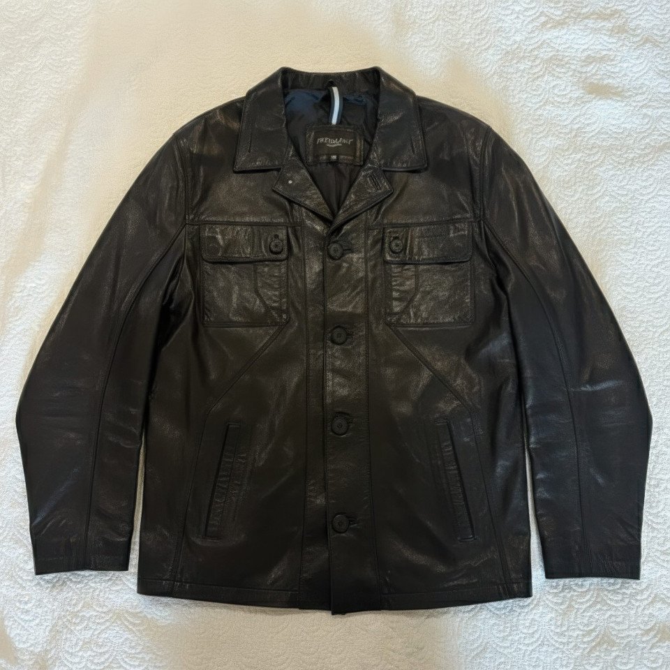 Leather jacket top down view on beige background google gemini prompt